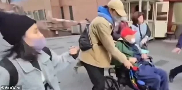 Chaotic Family Confrontation at Taipei Hospital: 102-Year-Old Tycoon's Caregiver Injured in Struggle