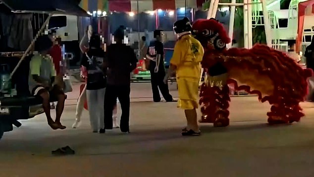 Thai Police in Red Dragon Costume Arrest Art Thief During Lunar New Year Celebrations