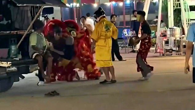 Thai Police in Red Dragon Costume Arrest Art Thief During Lunar New Year Celebrations