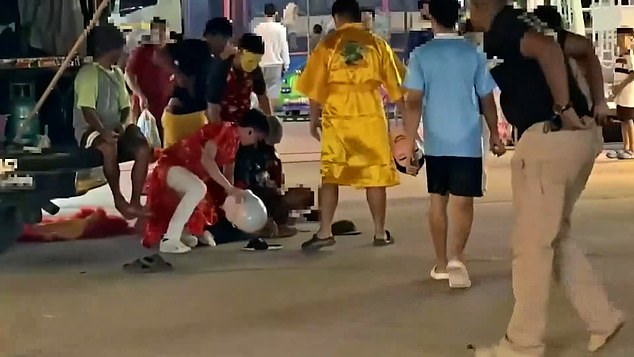 Thai Police in Red Dragon Costume Arrest Art Thief During Lunar New Year Celebrations