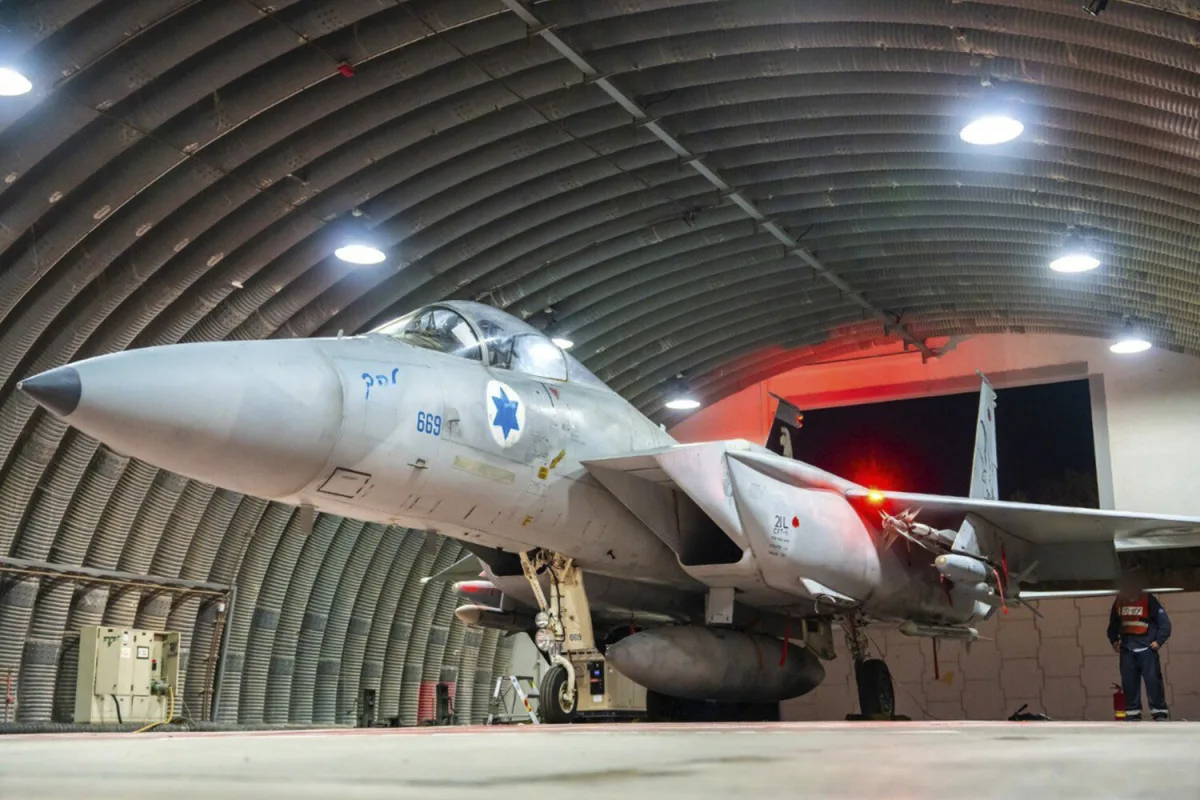 Israel and Hezbollah Escalate Cross-Border Hostilities with Targeted Strikes on Beirut Infrastructure and Rocket Attack on Haifa Naval Base