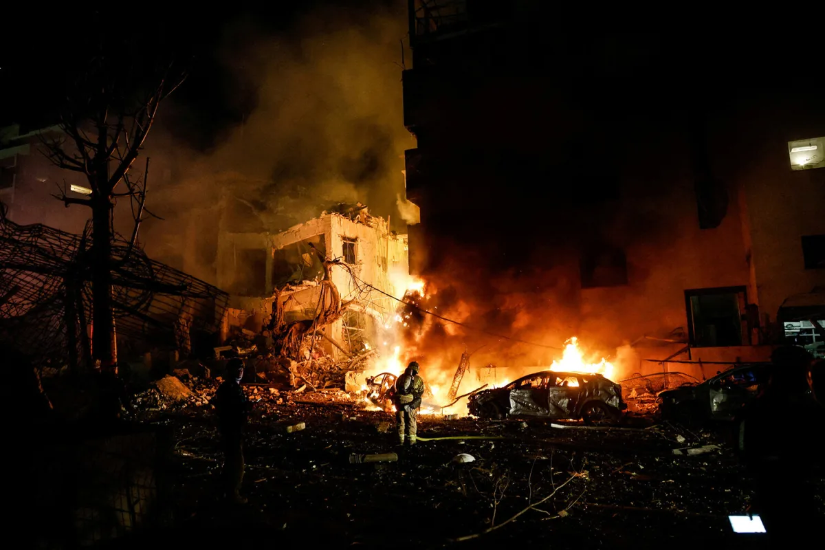 Iran Launches Attacks on Israel Cities and U.S. Base in Kuwait, Escalating Regional Tensions