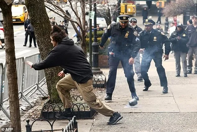 NYPD Officer's Viral Leap Becomes Symbol Of Law Enforcement Resolve As Pursuit Unfolds Amid Explosive Protests