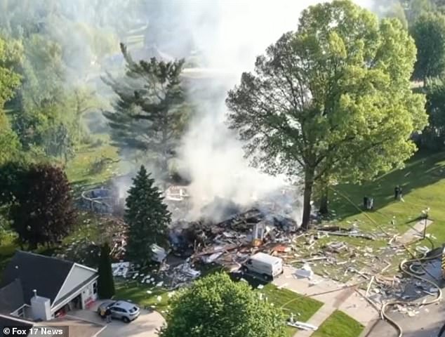 Kent County police investigate Michigan home fire as murder-suicide during divorce.
