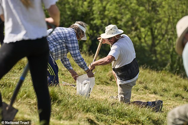 National Trust begins historic restoration of giant chalk figure.
