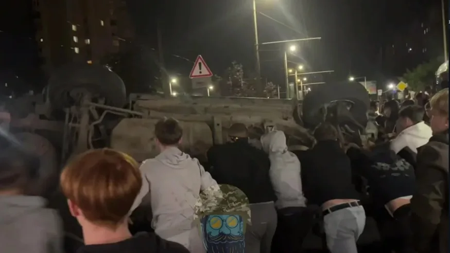Police fire live rounds, raid homes as Lviv unrest escalates over conscription.