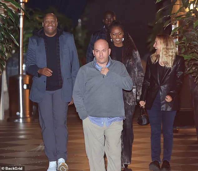 Michelle Obama's Public Appearance Fuels Speculation but Her Happy Outing with Brother Offers a Different Narrative