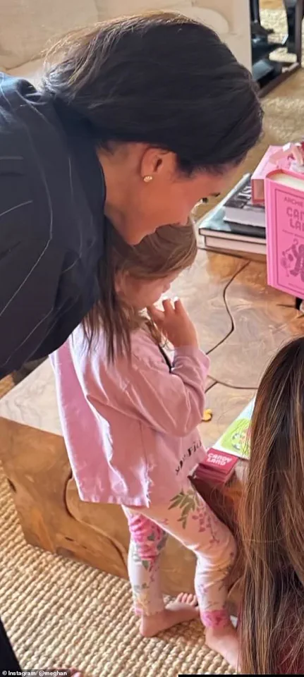 Emily pinches herself after meeting Meghan at a With Love, Meghan event at Soho House, New York.