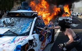 The Hidden Hand: Unveiling the Secret Network Behind the Unrest