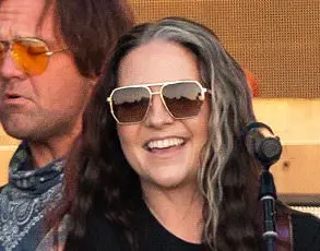 Grammy-Nominated Artist Ashley McBryde Discloses Vocal Cord Injury, Raises Questions About Artist Health and Career Impact